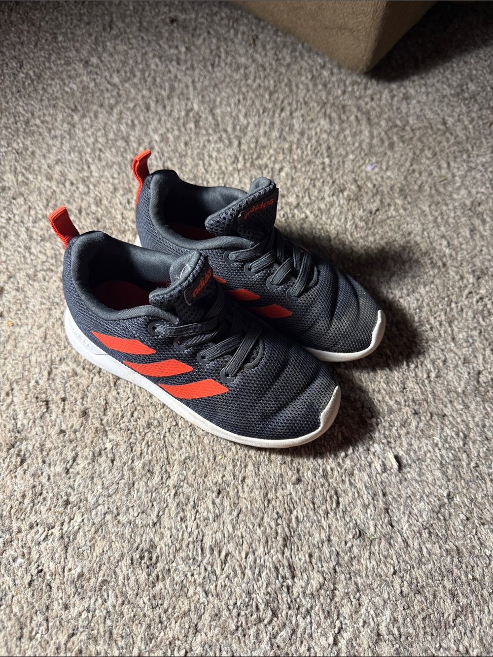 adidas Kids Black Sneakers with Orange Stripes